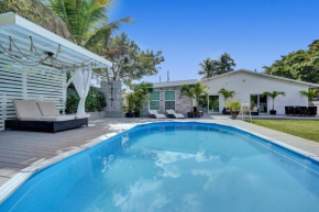 Stylish 4-bedroom property w/ pool and garden area